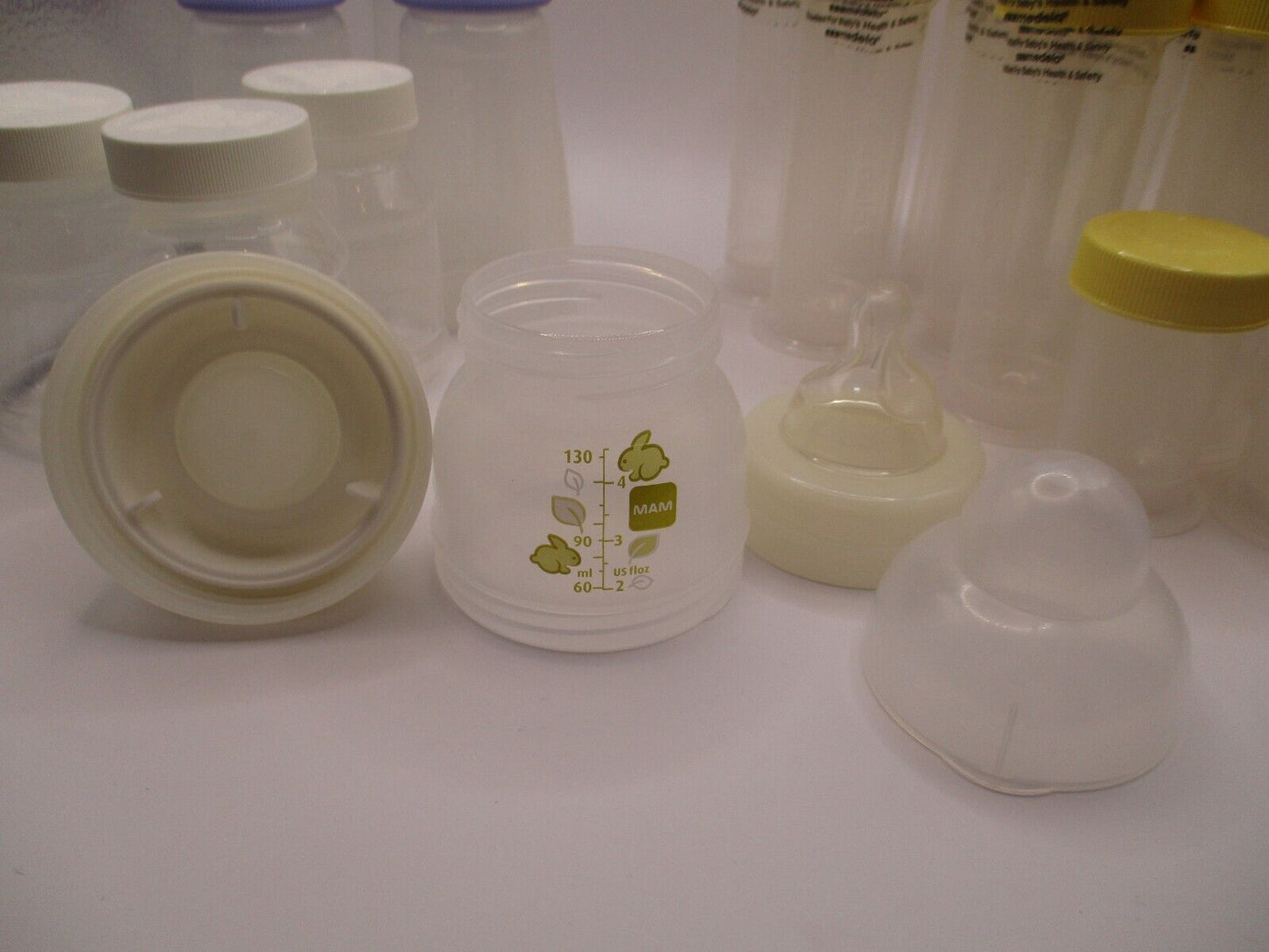 21 Medela, Lansinoh, Similac Breastmilk Storage Bottles and 1 MAM Bottle