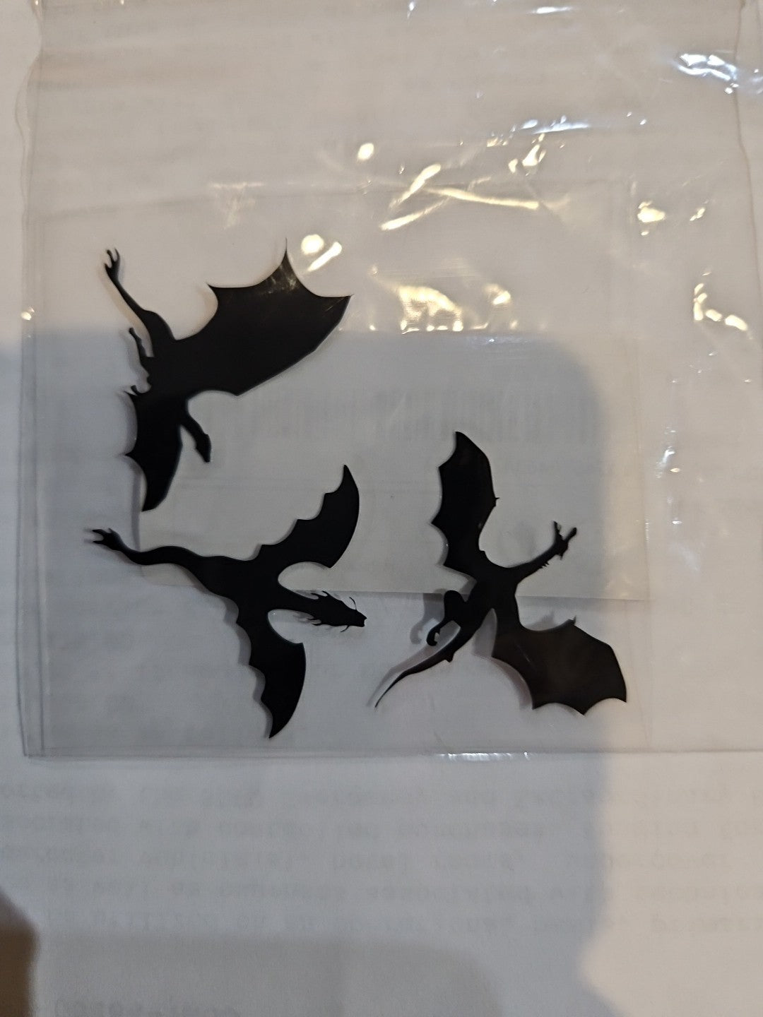 Three 1" x 1" Black Dragon Stickers