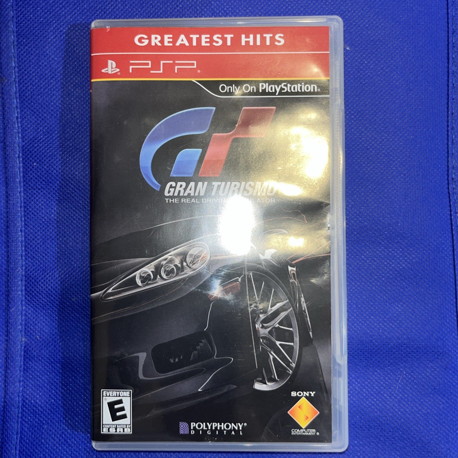 Gran Turismo Greatest Hits (PSP) NO GAME.  Case + Artwork + Manual. NO GAME