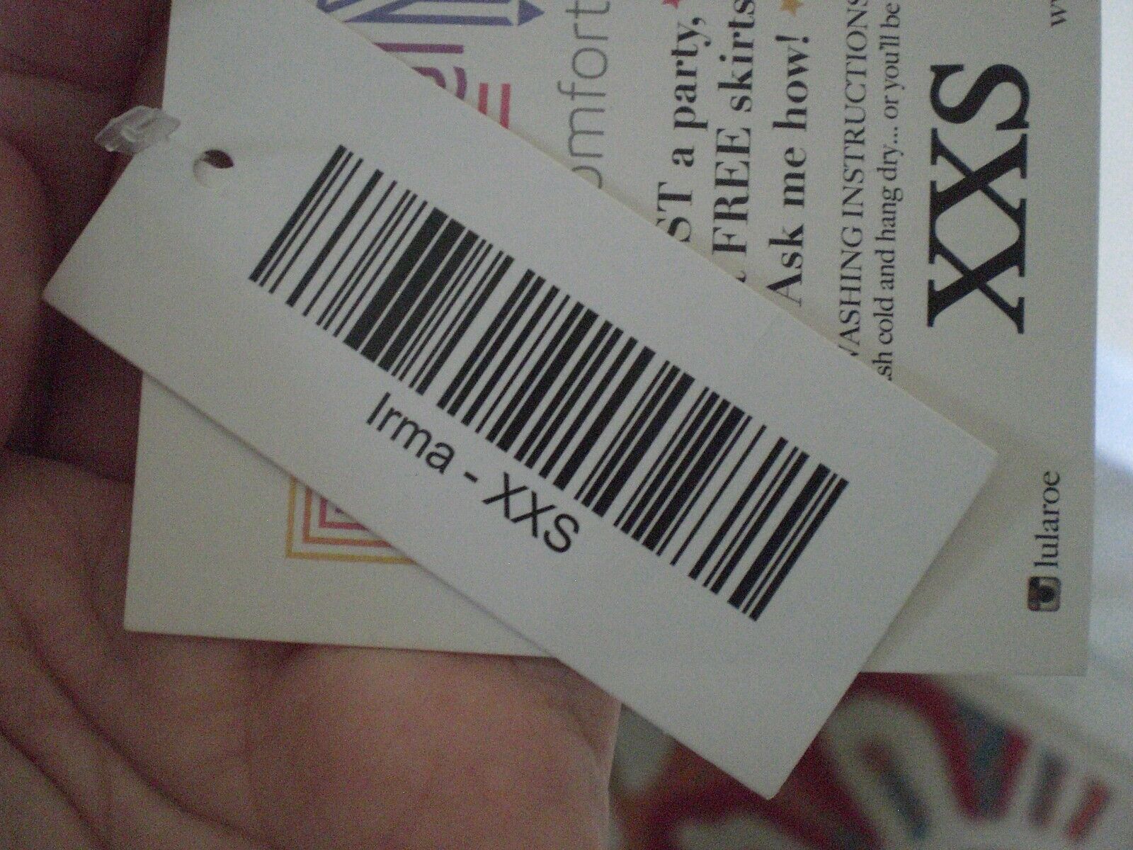 NWT LuLaRoe Irma Shirt Top Blouse Tunic XXS Black with White Geometric Shapes