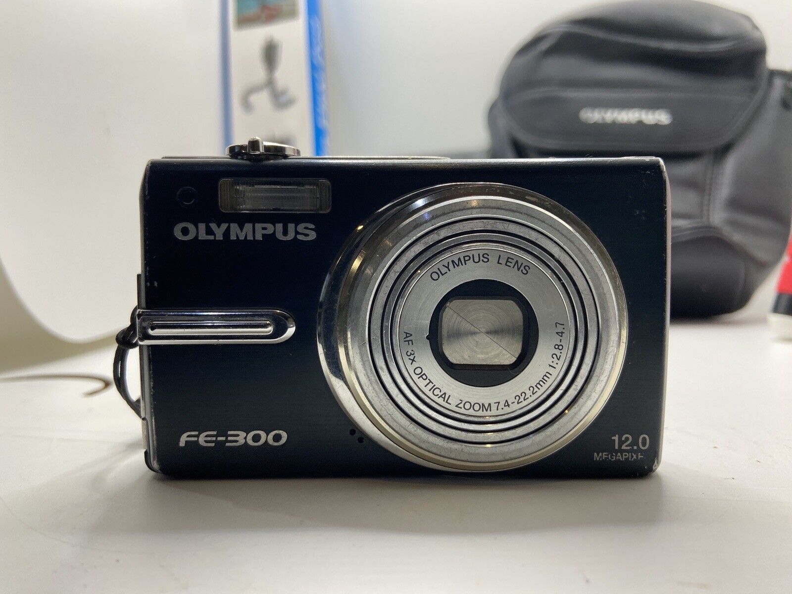 Olympus FE FE-300 12MP Tripod, Cases, Battery +Charger, 2GB BUNDLE TESTED