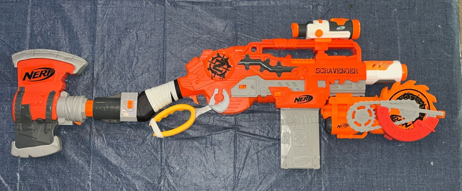 Nerf Zombie Strike Scavenger Rifle Twinslice Axe Hammer Scope 3xMags 10 Darts