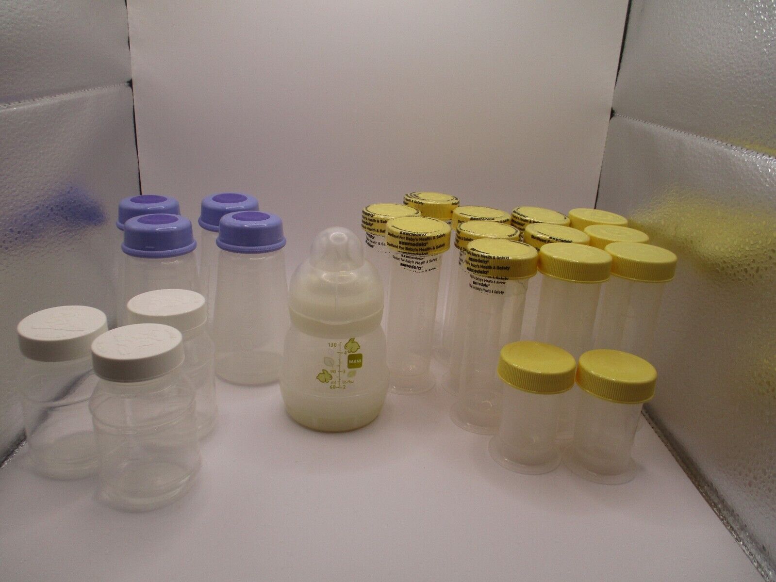 21 Medela, Lansinoh, Similac Breastmilk Storage Bottles and 1 MAM Bottle