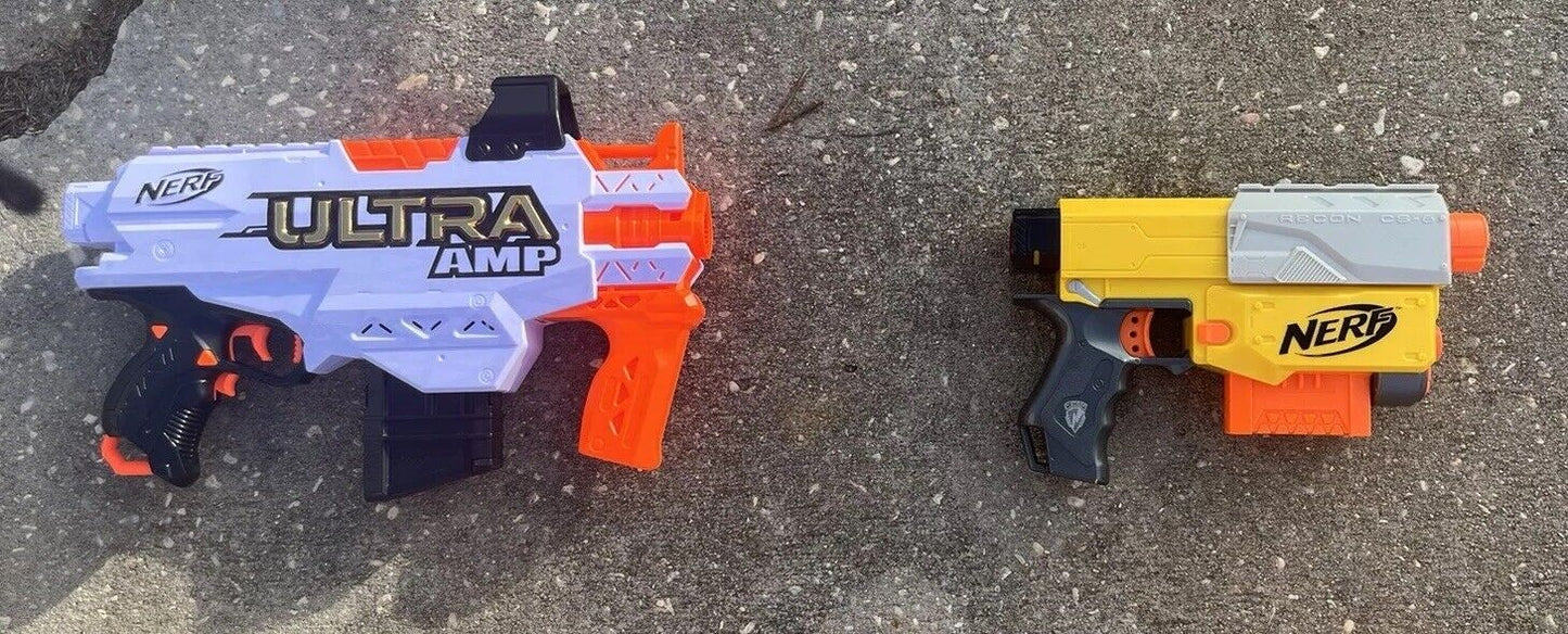 Box of Nerf Guns, Toys, and Accessories