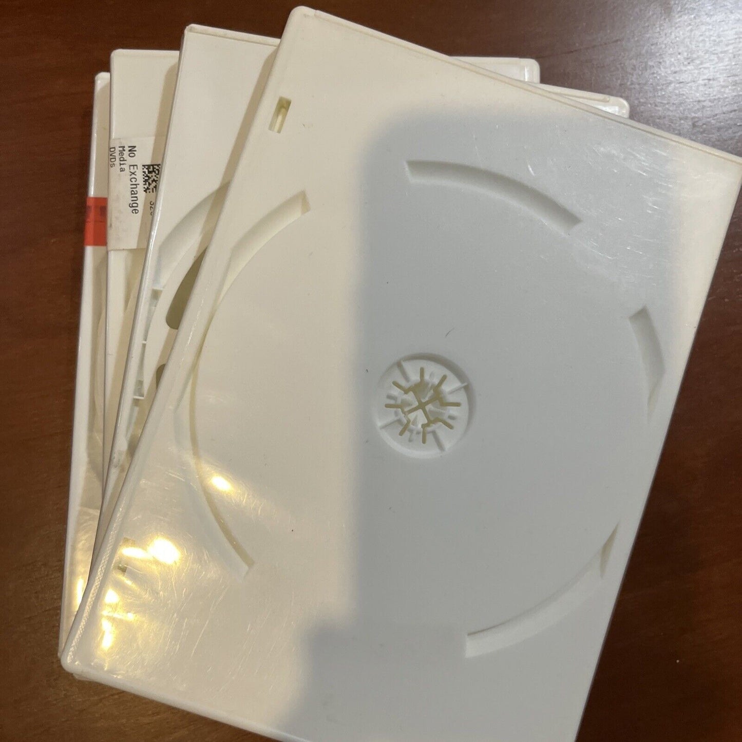 Qty = 4 Used DVD Cases. Undamaged - White