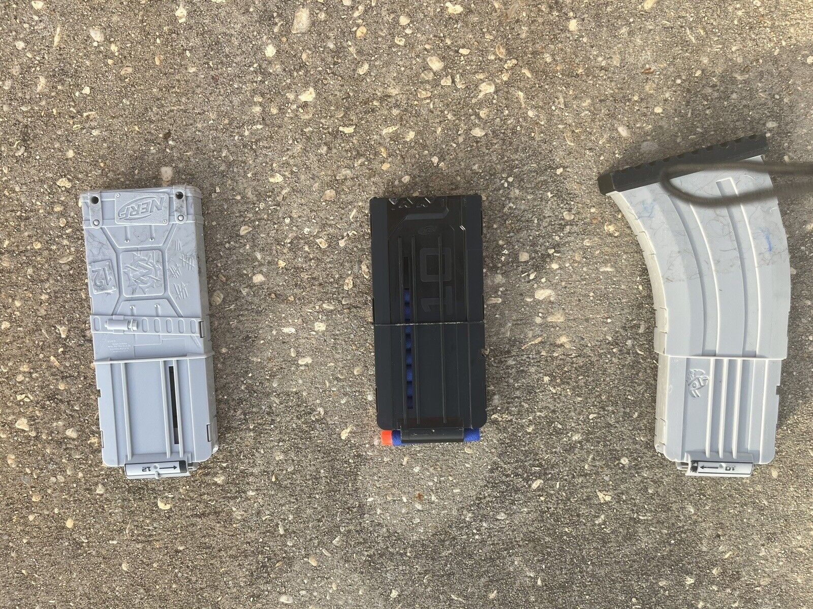 Box of Nerf Guns, Toys, and Accessories