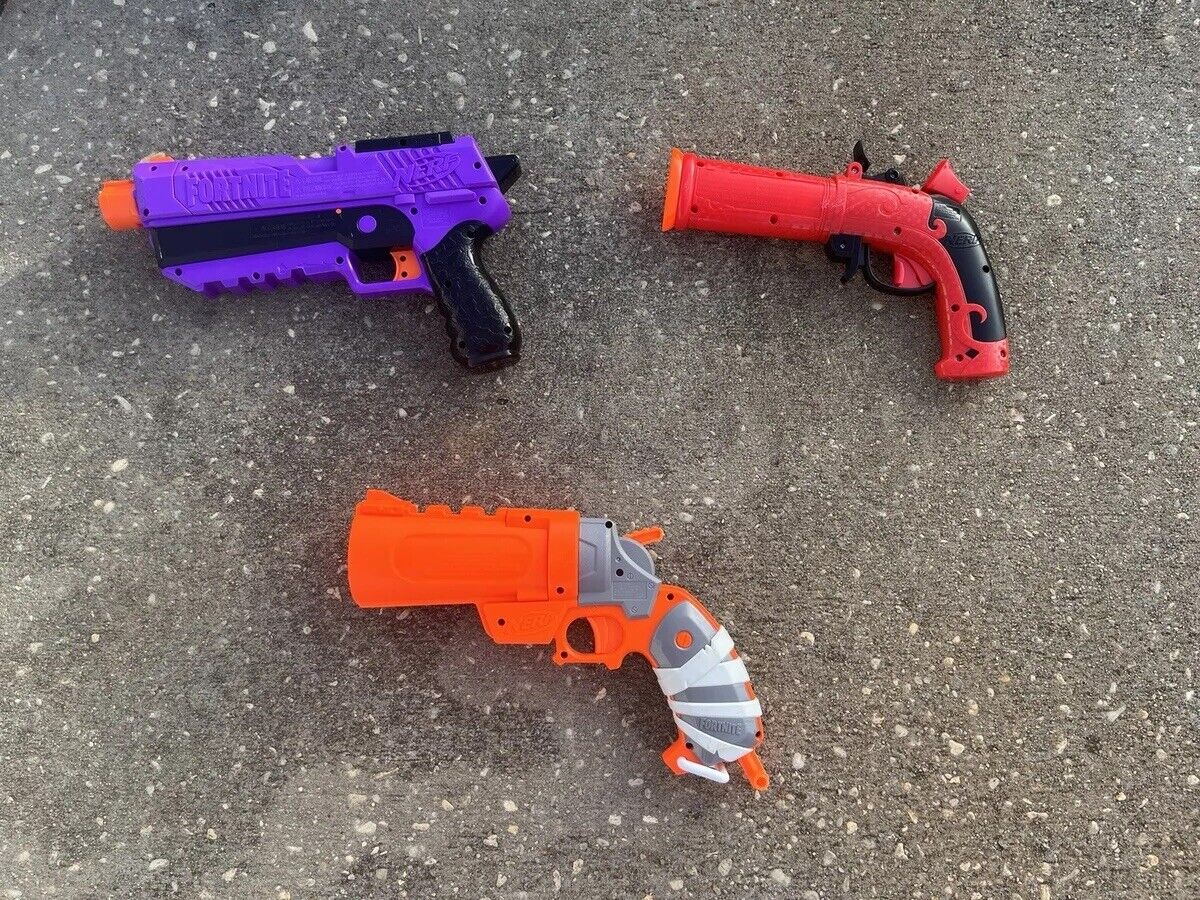 Box of Nerf Guns, Toys, and Accessories