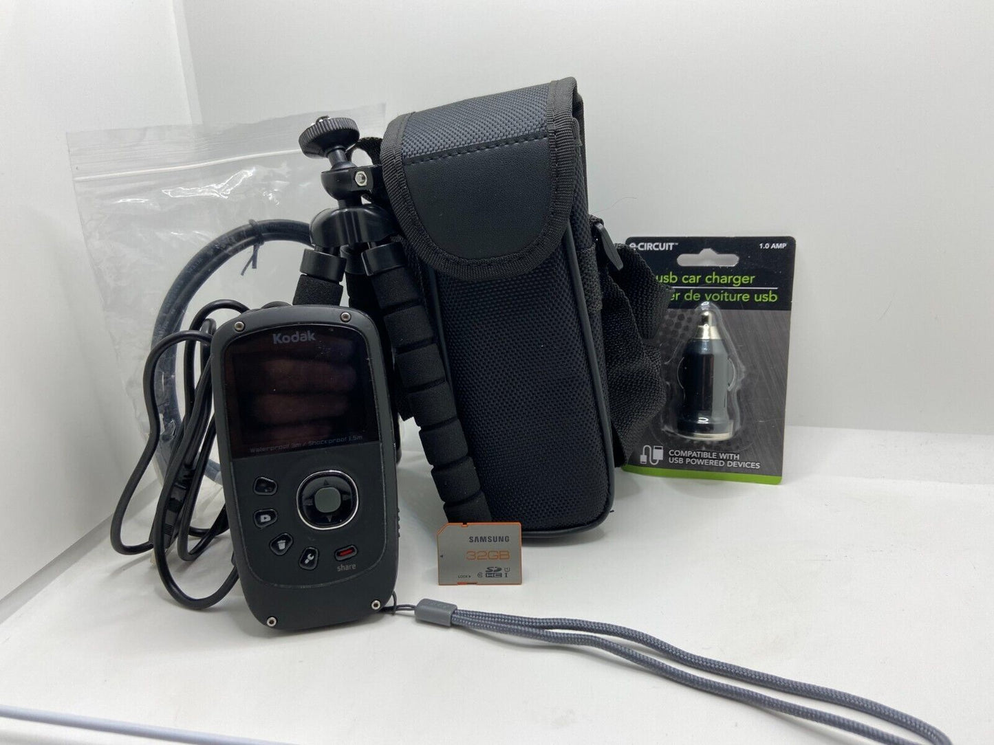 Kodak PlaySport ZX5 BLACK Waterproof Video Camera + Tripod + Case + 32GB Bundle