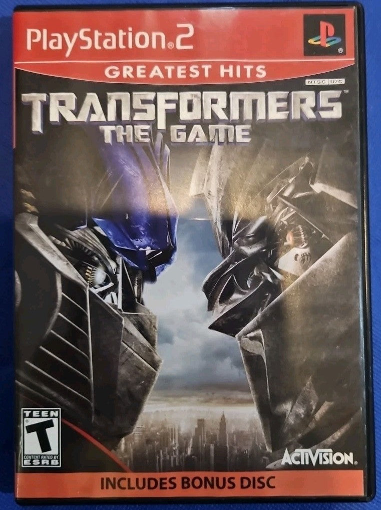 Transformers: The Game Greatest Hits (PS2) W/ Manual + Bonus Disc. Mint. Tested