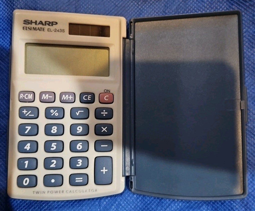 Sharp Elsmate EL=243S Solar Calculator. Tested
