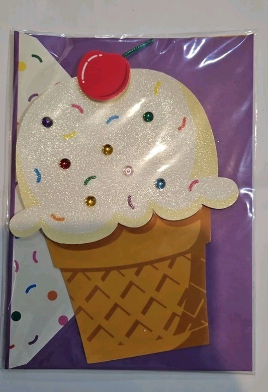 Ice Cream Cone With Cherry On Top And Sugar Sprinkles