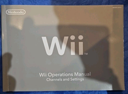 Wii Operations Manual (Soft Cover) In English, French & Spanish
